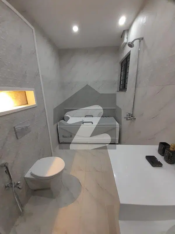 10 Marla New Residential House With 5 BEDS for Sale in behria town lahore